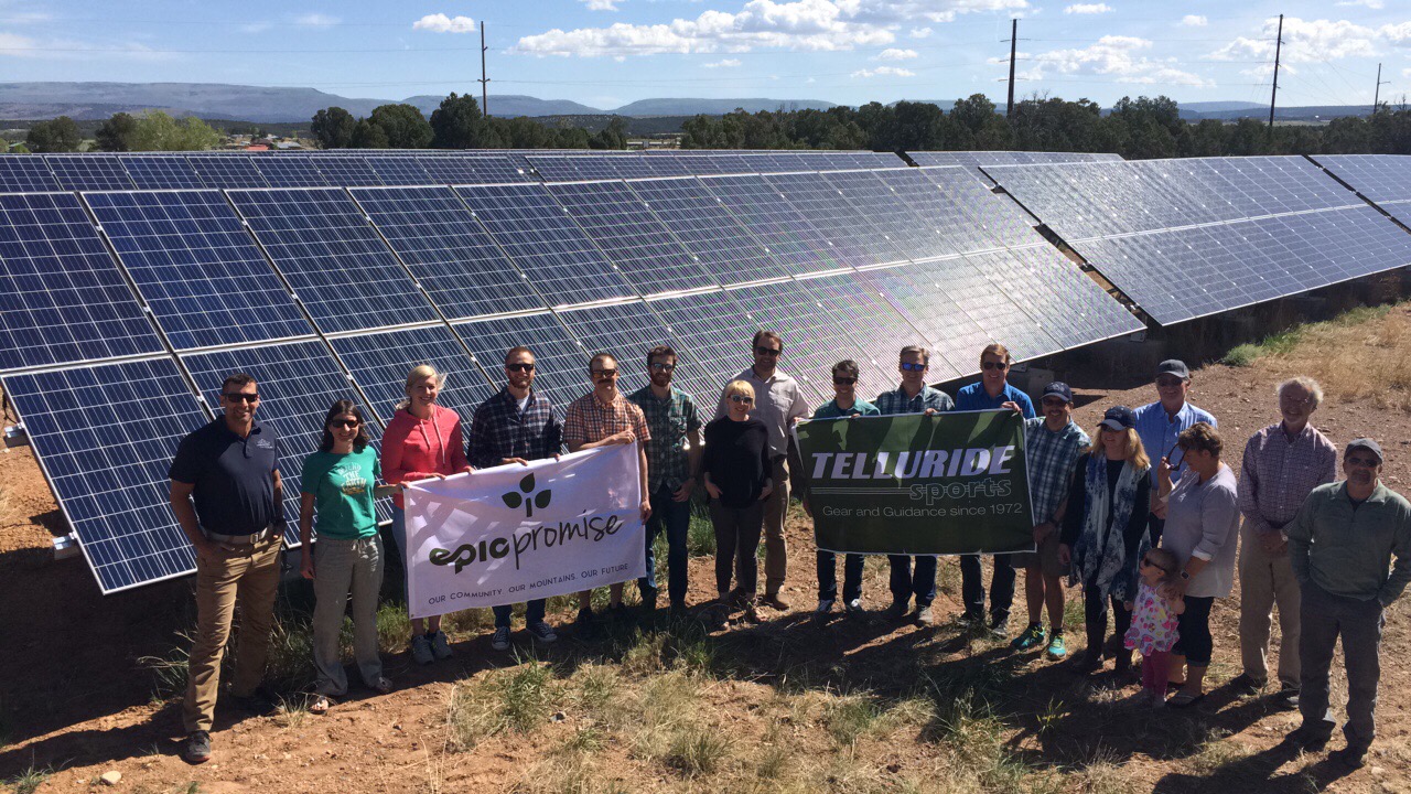 A celebration in front of the I.Q. Solar Array in Norwood